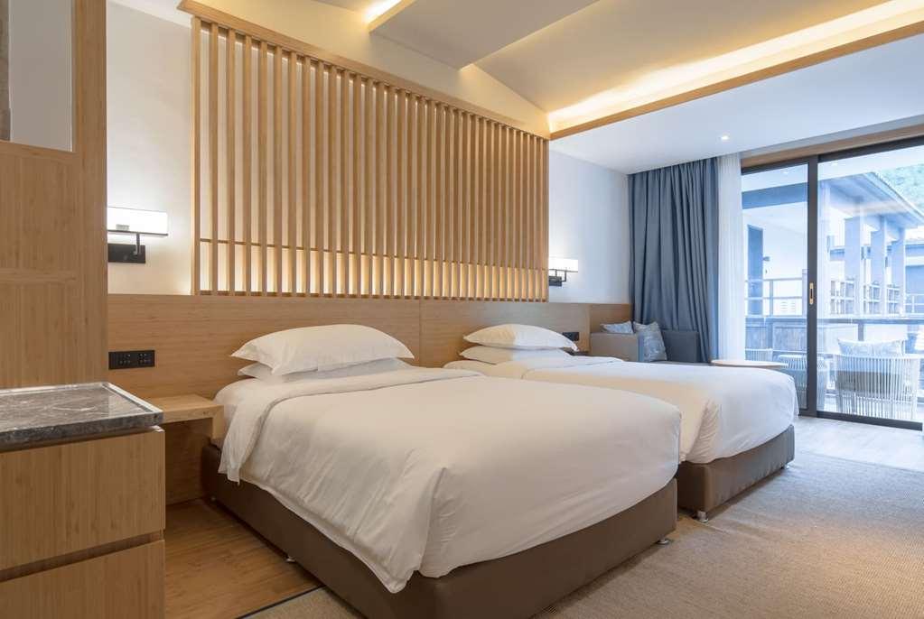 Howard Johnson Huashuiwan Hot Springs Resort Chengdu Quarto foto